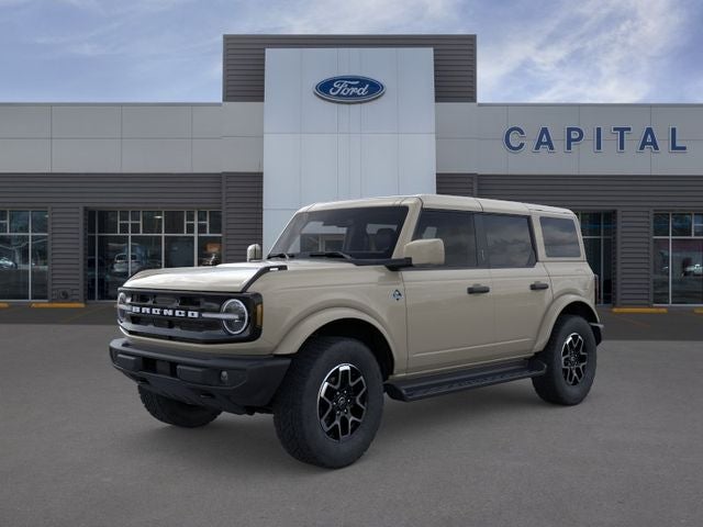 2026 Ford Bronco Outer Banks in Desert Sand — front three-quarter view