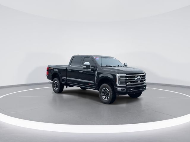 2024 Ford F-250SD Platinum in Black Metallic — front three-quarter view