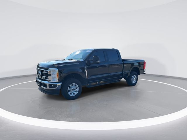 2023 Ford F-250SD XLT in Black Metallic — front three-quarter view