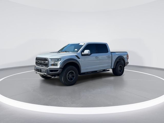 2017 Ford F-150 Raptor in Avalanche — front three-quarter view
