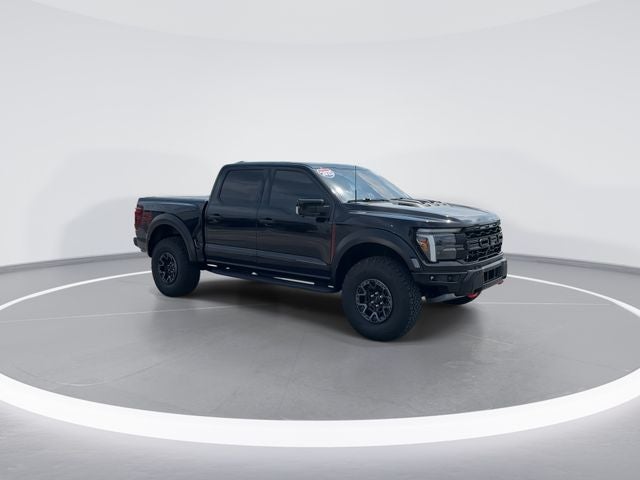 2025 Ford F-150 Raptor in Black Metallic — front three-quarter view