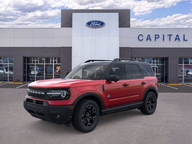 2026 Ford Bronco Sport Outer Banks in Ruby Red Metallic Tinted Clearcoat — front three-quarter view