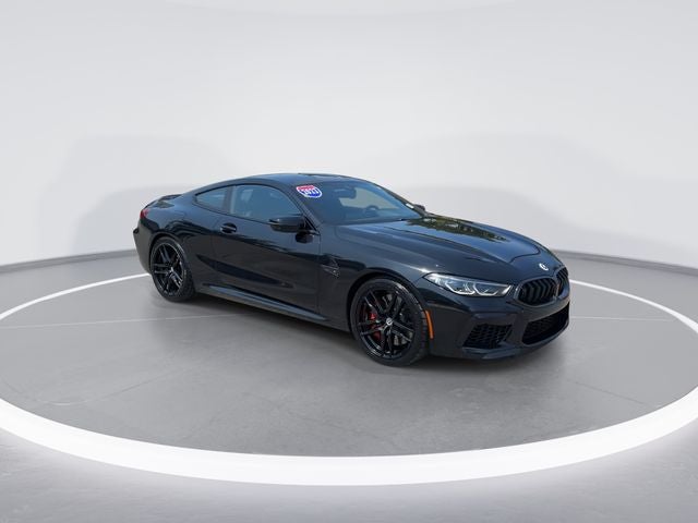 2023 BMW M8 Competition in Black Sapphire Metallic — front three-quarter view